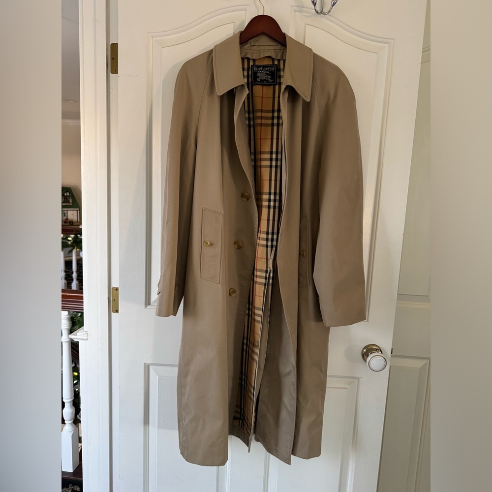 Burberry tan trench with classic plaid lining. 
Men’s trenchcoat. Jacket / coat